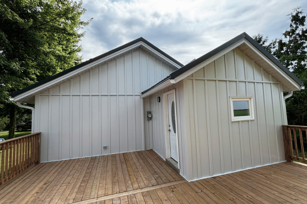Home addition with modern board and batten siding in Chatham, Ontario.